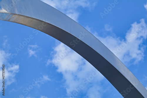 shiny metal monument with sky in the background © Andrzej
