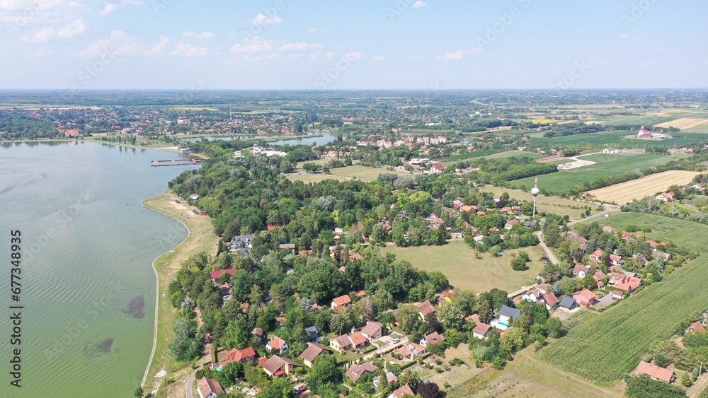 Aerial view of the villages on the shores of Palic Lake on a sunny day in Serbia