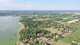 Aerial view of the villages on the shores of Palic Lake on a sunny day in Serbia