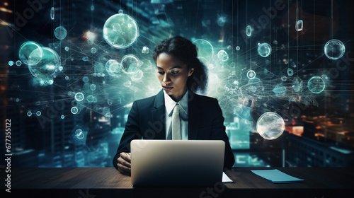 Businesswoman with laptop and digital data orbs backdrop photo