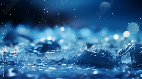 Sfondo, texture con ghiaccio e neve che si sciolgono con gocce d'acqua con sfondo blu photo