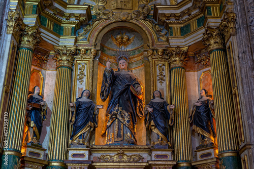 altar with representation of a saint on the side of the Jerónimos church in Lisbon. photo