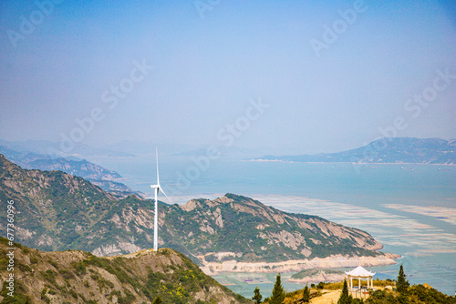 Flag crown of Lianjiang County, Fuzhou City, Fujian Province - high angle view of bay and fishing village under clear sky