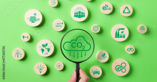Magnifying glass with reduce CO2 emission concept, Environment icons decrease CO2, Reduction carbon footprint, Renewable clean, Sustainable energy, Low carbon, Globe climate Change risk, Net Zero, ESG
