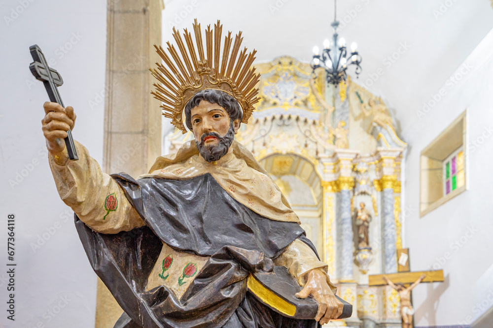Statue of the figure of São Domingos with the cross in his hand inside the church of Malpica do Tejo