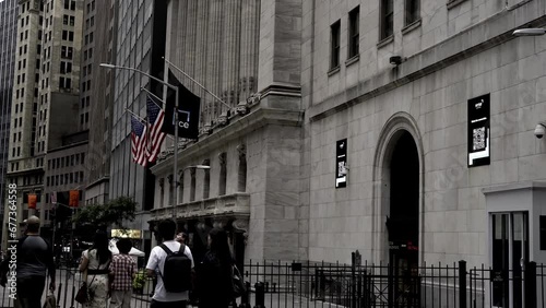 Tilt down New York Stock exchange Downtown Manhattan New York City