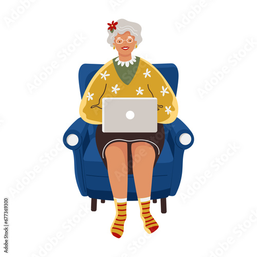 Grandma Or Senior Woman Sitting In The Armchair With Laptop