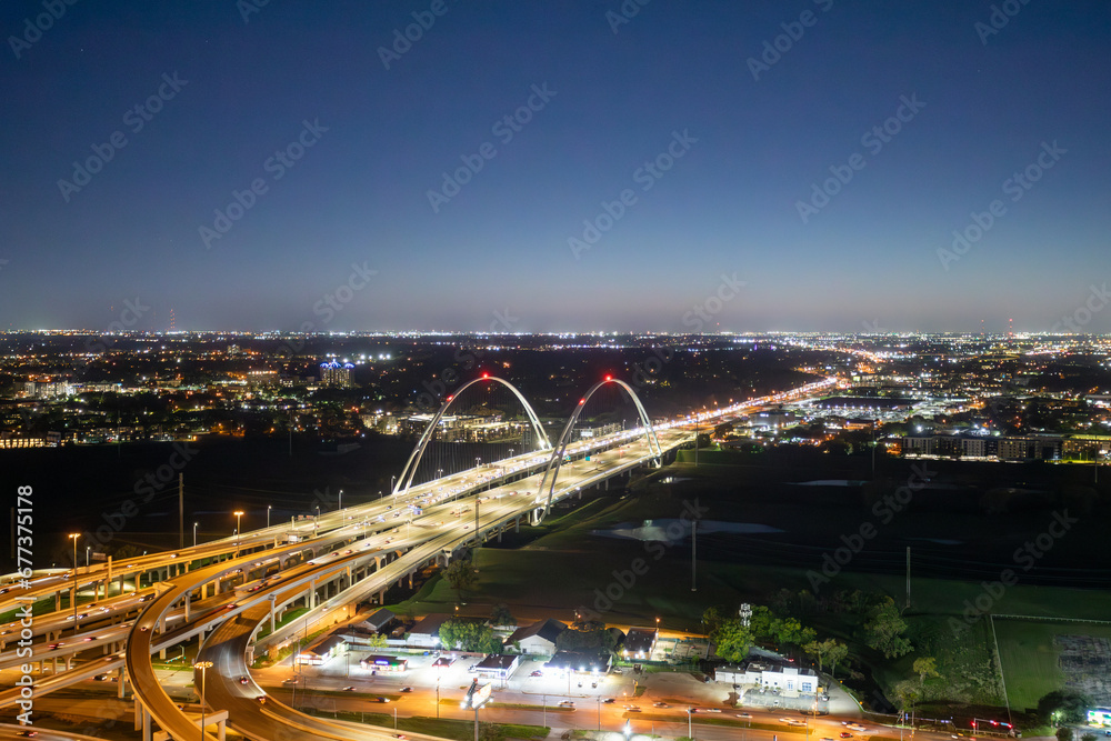 scenic skyline of Dallas by night with view to the highways and bridges, Texas