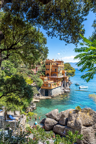 Fototapeta Naklejka Na Ścianę i Meble -  Portofino, Italy - August 3, 2023: Luxury houses along the Italian coast in Portofino, Italy