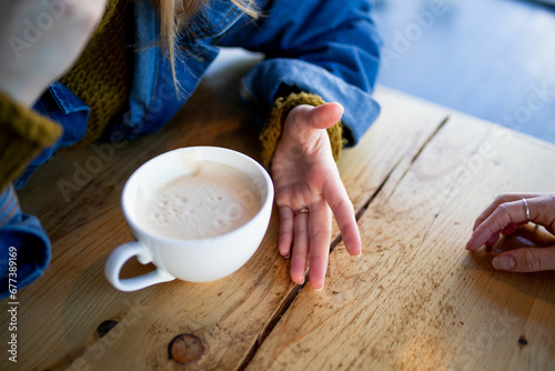 expressive hands coffee cup photo