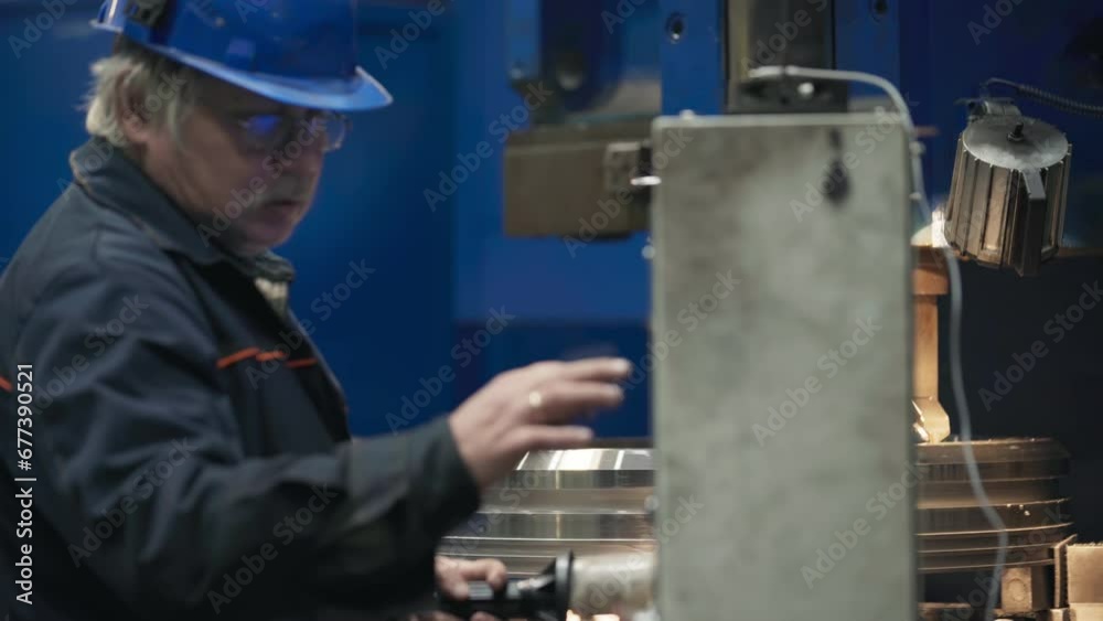 Professional Engineer Controls Production Machine Using Electronic Panel. Configuring Industrial Production Machine By Pressing Buttons On Panel. Worker Adjusts Metallurgy Production Machine Panel Professional Engineer Controls Production Machine Using Electronic Panel. Configuring Industrial Production Machine By Pressing Buttons On Panel. Worker Adjusts Metallurgy Production Machine Panel