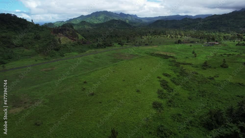 Aerial top down view of tropical jungle green rainforest. Bird eye view of Green exotic wilderness landscape of FIji Island. Travel tourism concept. Drone shot of thick brazil Fiji forest. Wild place Aerial top down view of tropical jungle green rainforest. Bird eye view of Green exotic wilderness landscape of FIji Island. Travel tourism concept. Drone shot of thick brazil Fiji forest. Wild place