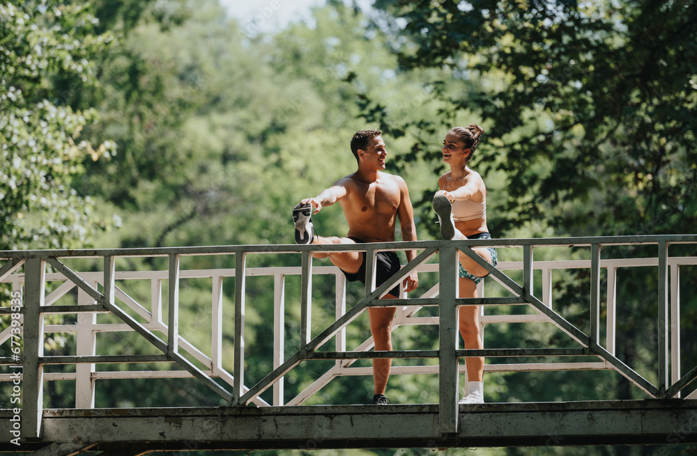 Caucasian athletes warm up in a park, preparing for an outdoor workout. Their persistence and dedication to a healthy lifestyle are evident as they challenge themselves and stretch their muscles. Caucasian athletes warm up in a park, preparing for an outdoor workout. Their persistence and dedication to a healthy lifestyle are evident as they challenge themselves and stretch their muscles.