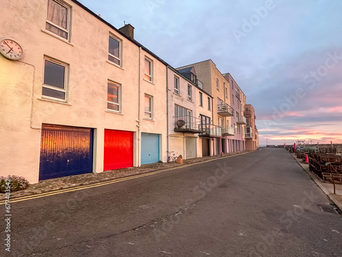 St Andrews, Scotland - September 22, 2023: Views of the buildings, vessels, breakwater and marina in St Andrews Scotland at sunrise 