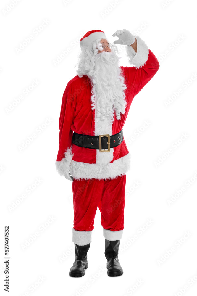 Man in Santa Claus costume posing on white background Man in Santa Claus costume posing on white background