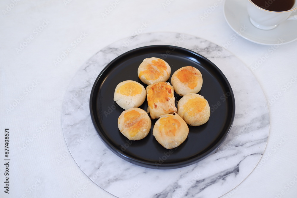 Bakpia, Bakpia Pathok is a typical Yogyakarta food made from a mixture of green beans, cheese and sugar, which is wrapped in flour, then baked. Bakpia, Bakpia Pathok is a typical Yogyakarta food made from a mixture of green beans, cheese and sugar, which is wrapped in flour, then baked.