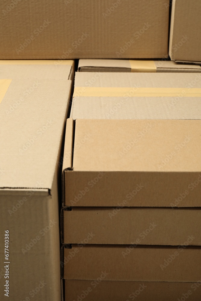 Many cardboard boxes as background, closeup. Packaging goods Many cardboard boxes as background, closeup. Packaging goods