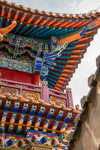 Roof decorations and architectural details at Da Zhao or Wuliang temple, China.