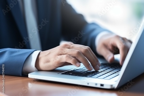 close up of a Man hand typing on computer keyboard for business © Muh