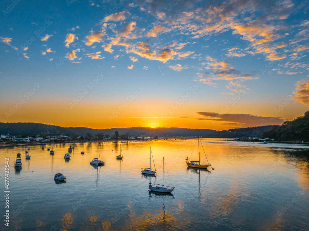 Sunrise views over the channel and bay with boats