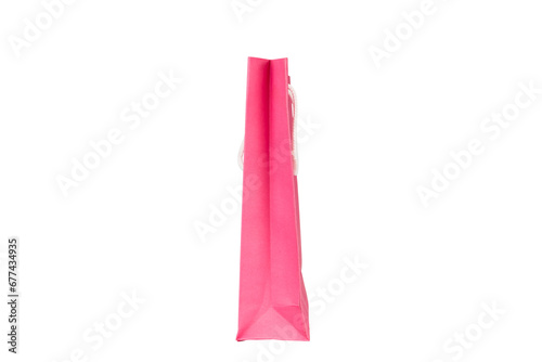 Side view of pink paper bag isolated on white background with clipping path.