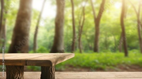 a wooden table in front of trees