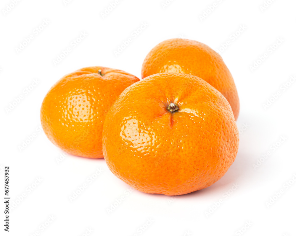 Three orange mandarins on white background. Tangerines front view. Three orange mandarins on white background. Tangerines front view.