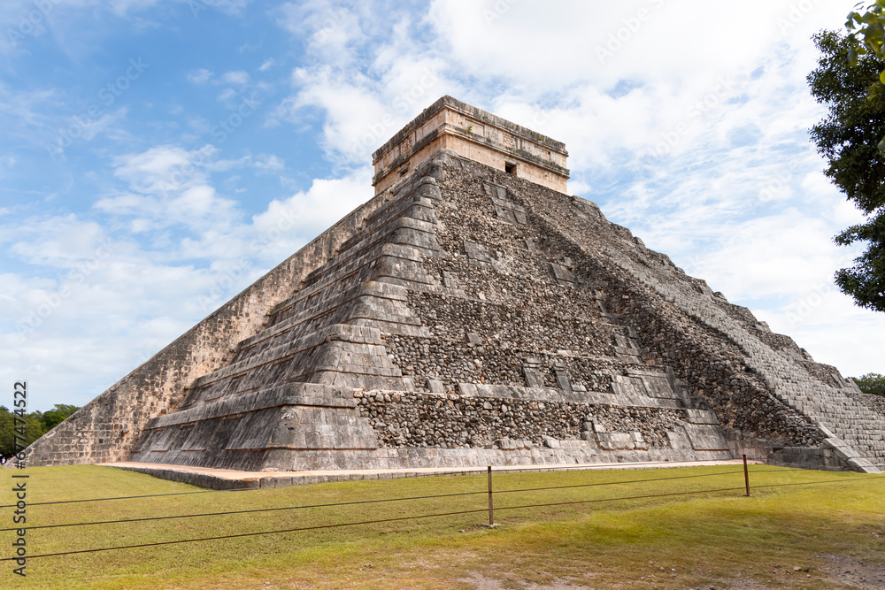 Famous El Castillo pyramid with shadow of serpent at Maya archaeological site of Chichen Itza in Yucatan, Mexico