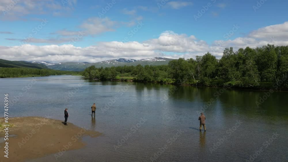 Group of people fishing in pristine landscape, aerial view Group of people fishing in pristine landscape, aerial view