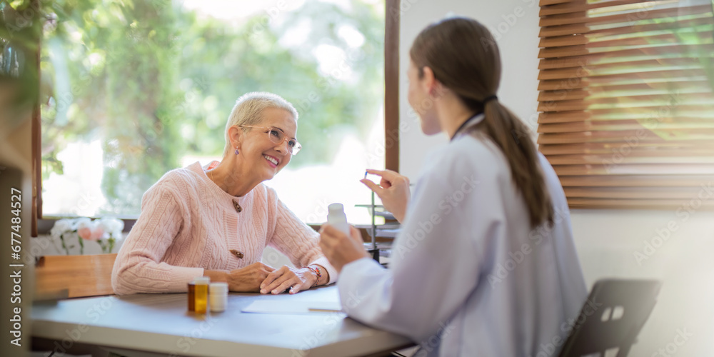 doctor discussion results or symptoms and gives Give advice about medicine to a senior women patient, giving consultation during medical examination in clinic doctor discussion results or symptoms and gives Give advice about medicine to a senior women patient, giving consultation during medical examination in clinic