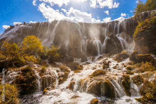 Jiuzhaigou national park and Pearl Shoal Waterfalls during autumn in Ngawa Tibetan and Qiang in Sichuan , China : 17 October 2023. photo