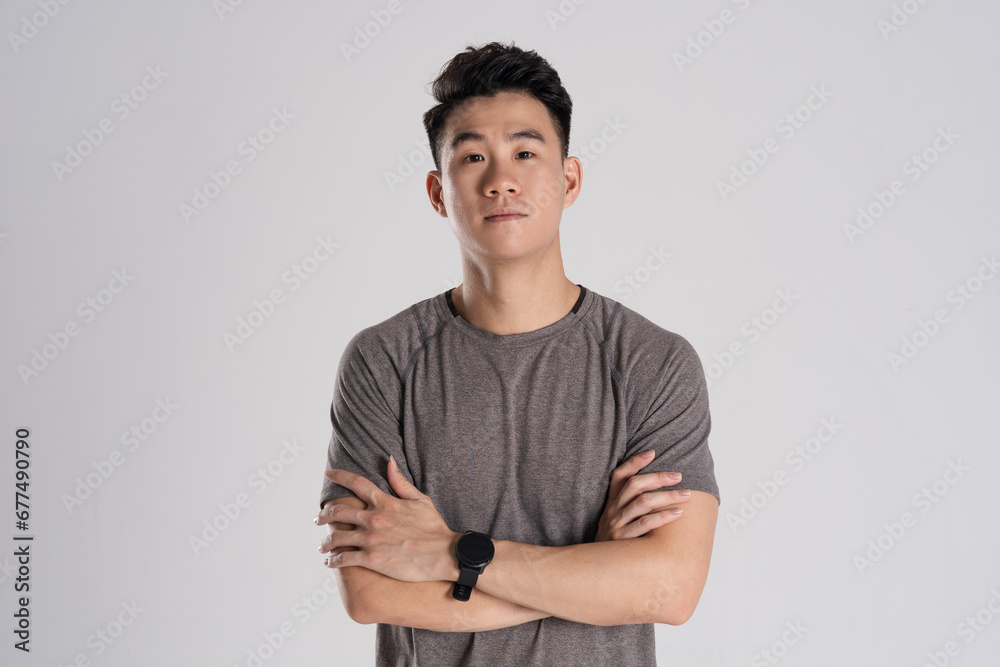 Image of Asian man exercising on white background Image of Asian man exercising on white background