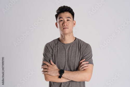 Image of Asian man exercising on white background photo