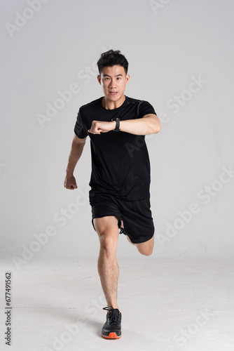 Image of an Asian runner, isolated on white background © 1112000