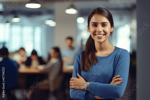 Business woman, designer and portrait of happy employee working, arms crossed and marketing agency, startup and creative company, Smile, happiness and young employee internship at advertising agency photo