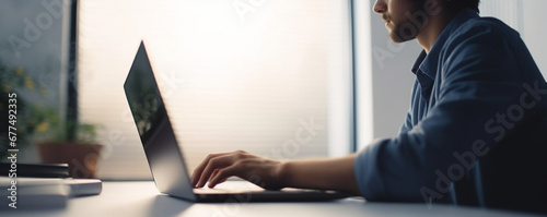 Businessperson working on laptop at workplace, Student studying or learning online via computer at home, Idea of business financial and education knowledge concept, Training course online via internet photo