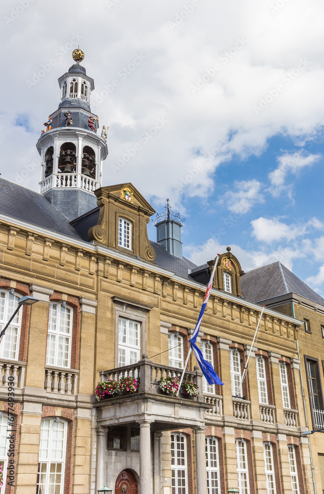 Flag on the balcony of the historic town hall of Roermond, Netherlands