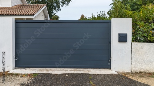 Aluminum gray sliding modern grey portal closed of suburb garden door house