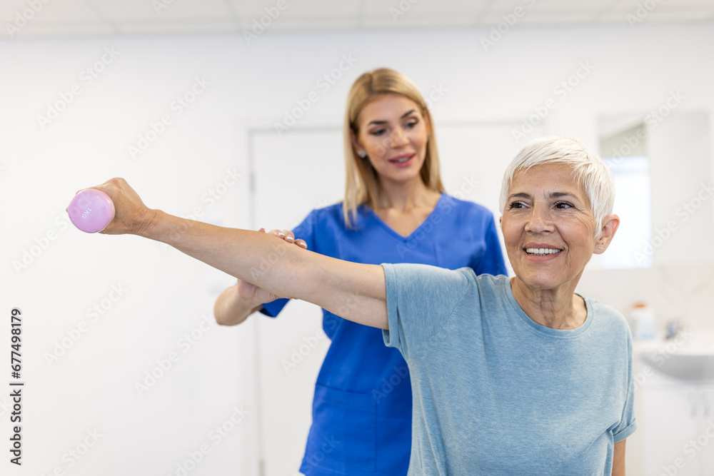 Medical, training and physiotherapy with dumbbell and old woman with nurse for rehabilitation, support and retirement. Healthcare, help and physical therapy with patient and doctor in nursing home