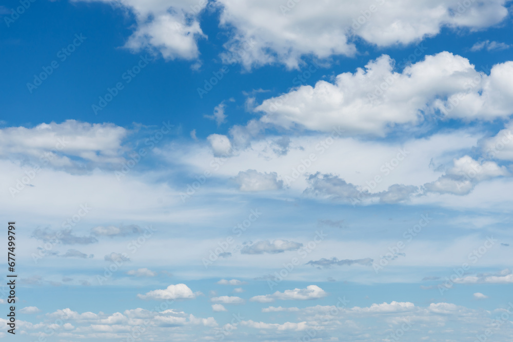Cumulus clouds in blue sky, white fluffy clouds floating in blue sky, blue sky background with clouds Cumulus clouds in blue sky, white fluffy clouds floating in blue sky, blue sky background with clouds