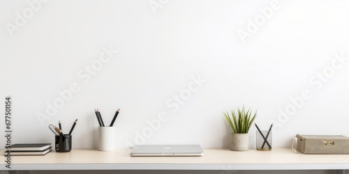 Office table, empty desk with simple office things and white wall copy space. Creative workspace, Generative AI photo
