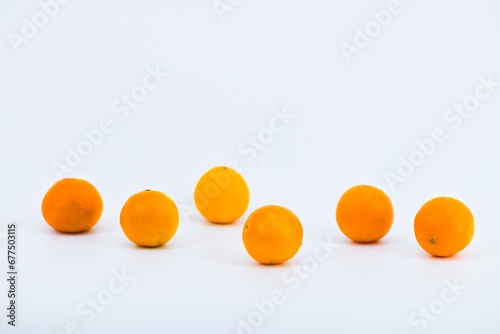 A vibrant image showcasing mandarins on a white background.