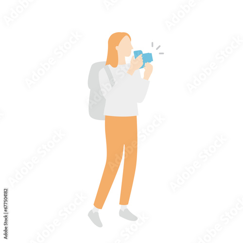 写真撮影をする女性