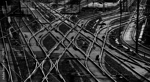 Photos Panoramic view of a complicated system of railway tracks and switches at a big station forming geometrical structures and lines