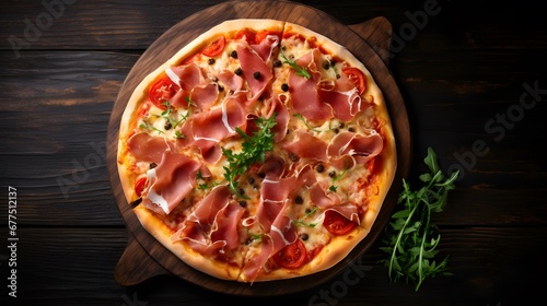 Pizza with prosciutto (parma ham) on dark wooden background top view. Italian cuisine. Space for text.