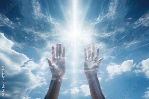 Hands of Lord Jesus Christ blessing the sky with beautiful clouds and sunlight.