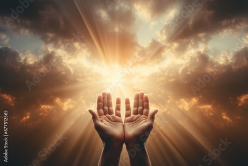 Hands of Lord Jesus Christ blessing the sky with beautiful clouds and sunlight.