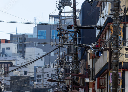 A lot of electric wires on a pole  electricity transmission in Japan