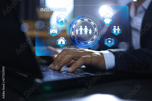Insurance concept with businessman using laptop working on life insurance program to choose plan such as travel or health care and natural disaster against home and residential