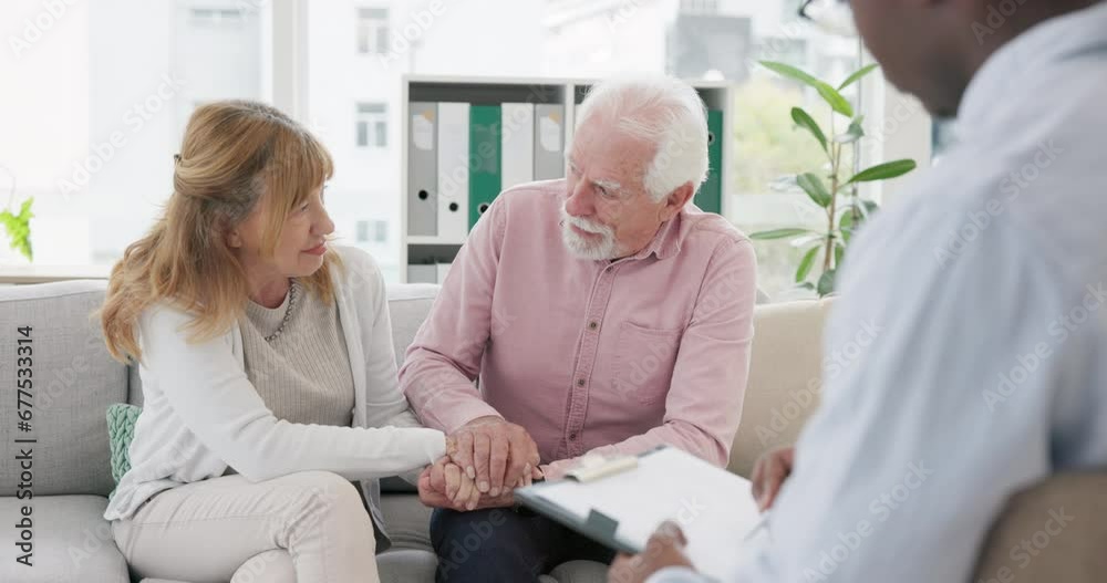 Counseling, support and senior couple with therapist in consultation for help, talk or crisis guidance. Therapy, depression and old people holding hands consulting marriage or mental health expert Counseling, support and senior couple with therapist in consultation for help, talk or crisis guidance. Therapy, depression and old people holding hands consulting marriage or mental health expert